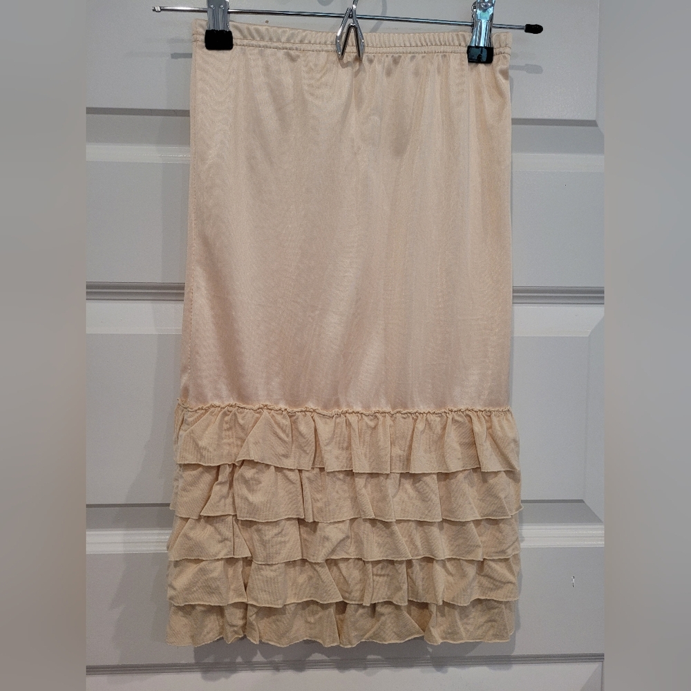 Nuggles Cream Ruffled Skirt Extender, Size 10